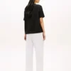 Tricou cu croială lejeră și buzunar cu nasture auriu Tricou cu croială lejeră și buzunar cu nasture auriu