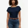 Tricou cu guler în formă de barcă și nasturi aurii, în stil nautic Tricou cu guler în formă de barcă și nasturi aurii, în stil nautic