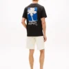 Tricou cu imprimeu cu palmier pe spate Tricou cu imprimeu cu palmier pe spate