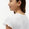 Tricou pentru copii cu mâneci cu bordură din material textil