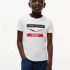 Tricou pentru copii Tommy x Cadillac F1® Team Chevron Tricou pentru copii Tommy x Cadillac F1® Team Chevron